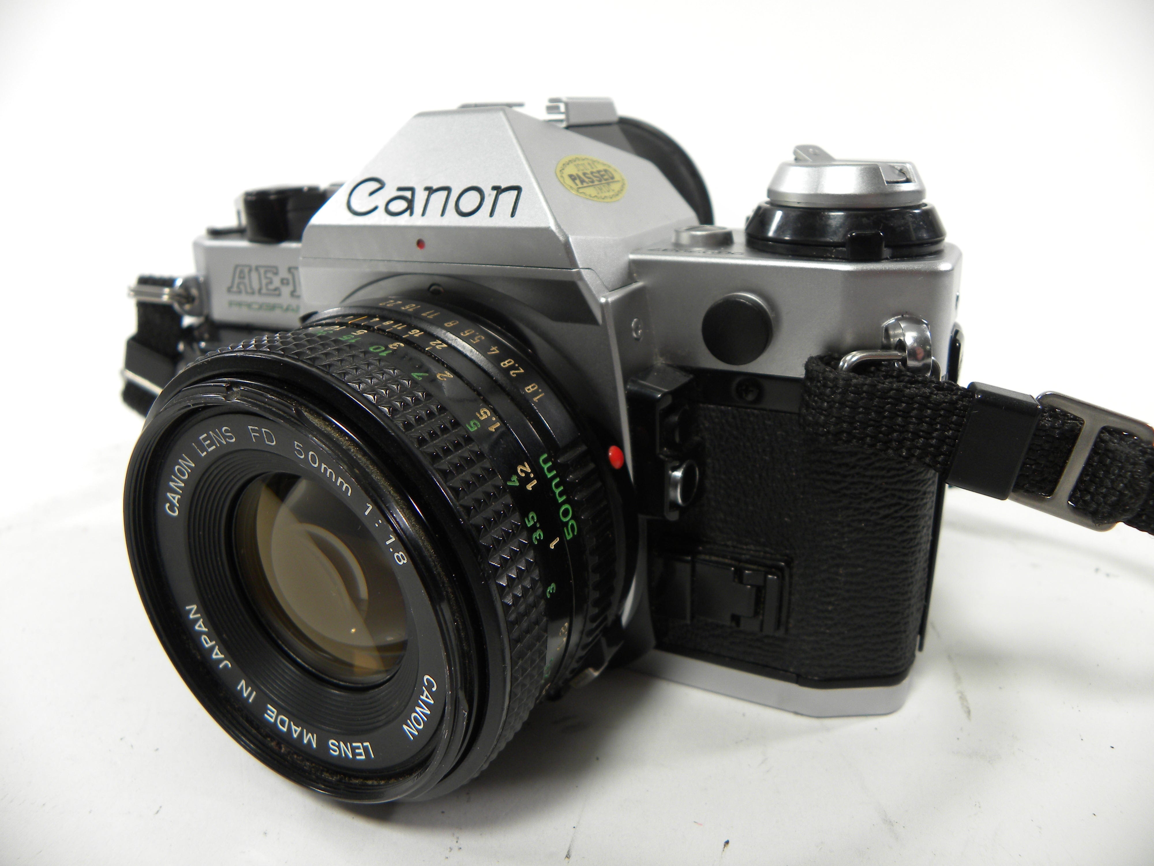 Canon AE-1 Program 35mm SLR Camera with 50mm f/1.8 FD Lens