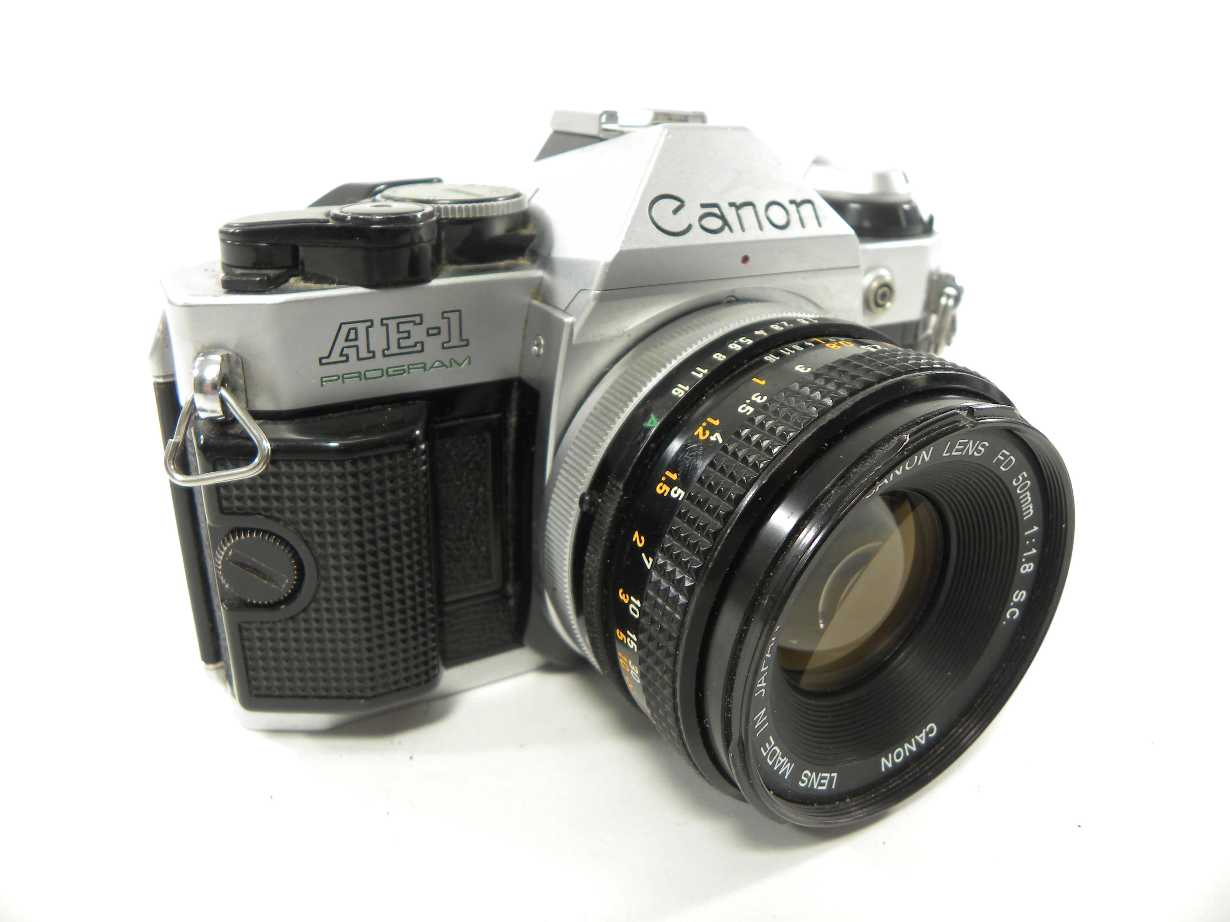 Canon AE-1 Program 35mm SLR Camera with a 50mm f/1.8 S.C. FD Lens