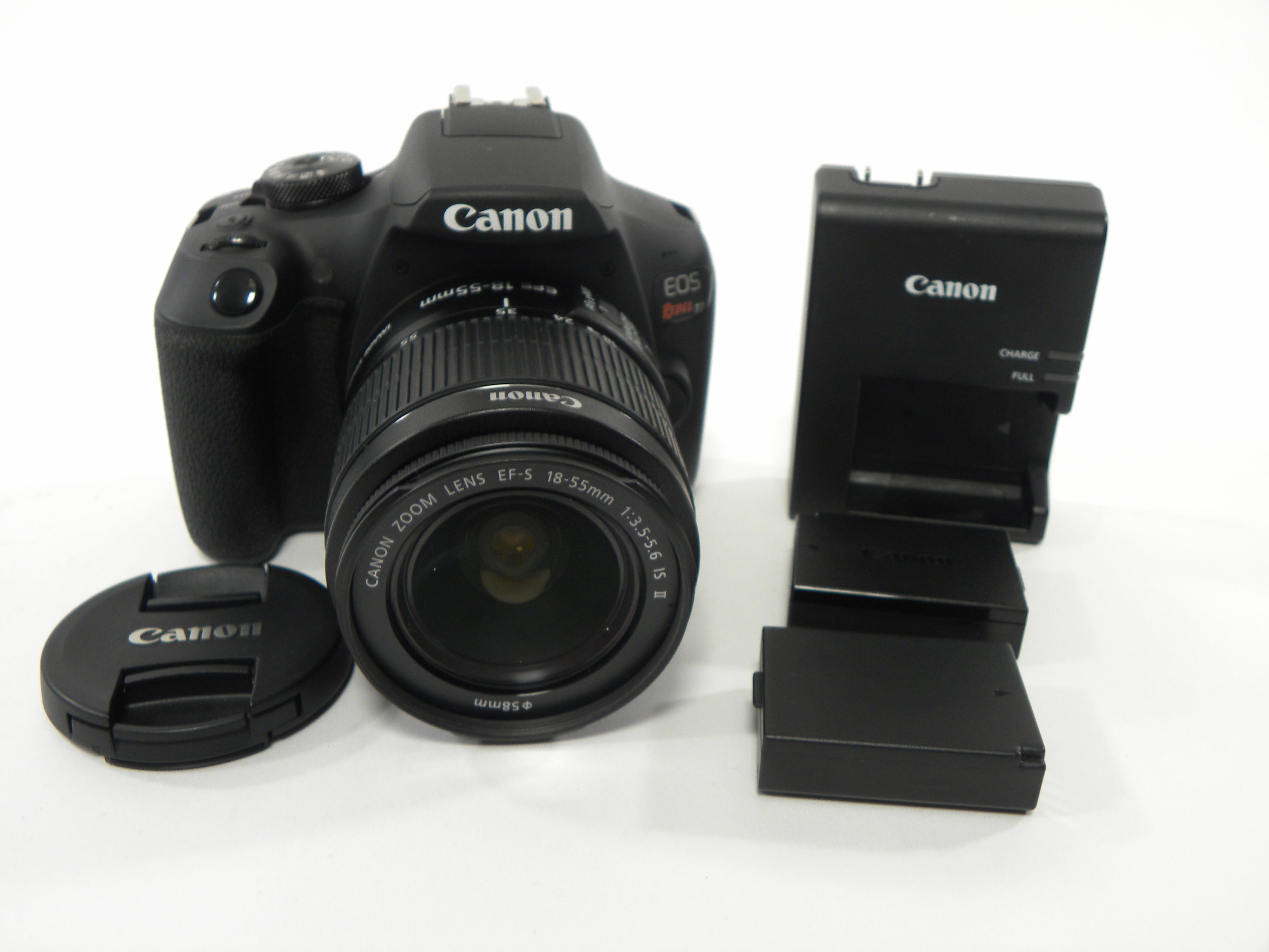 Canon EOS Rebel T7 24.2mp Digital SLR w/EF-S 18-55 IS II Shutter Ct. 7,433