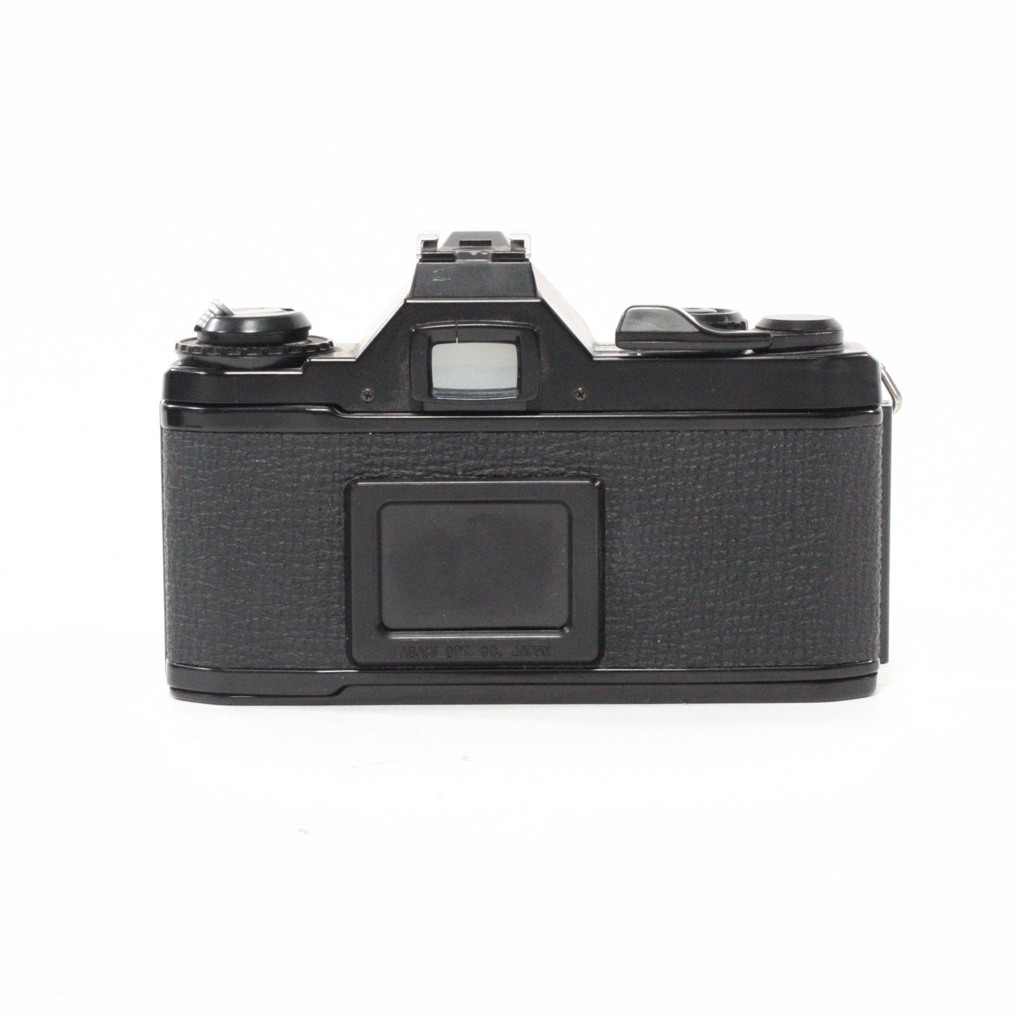 Pentax MV1 with a 50mm f/2 lens.
