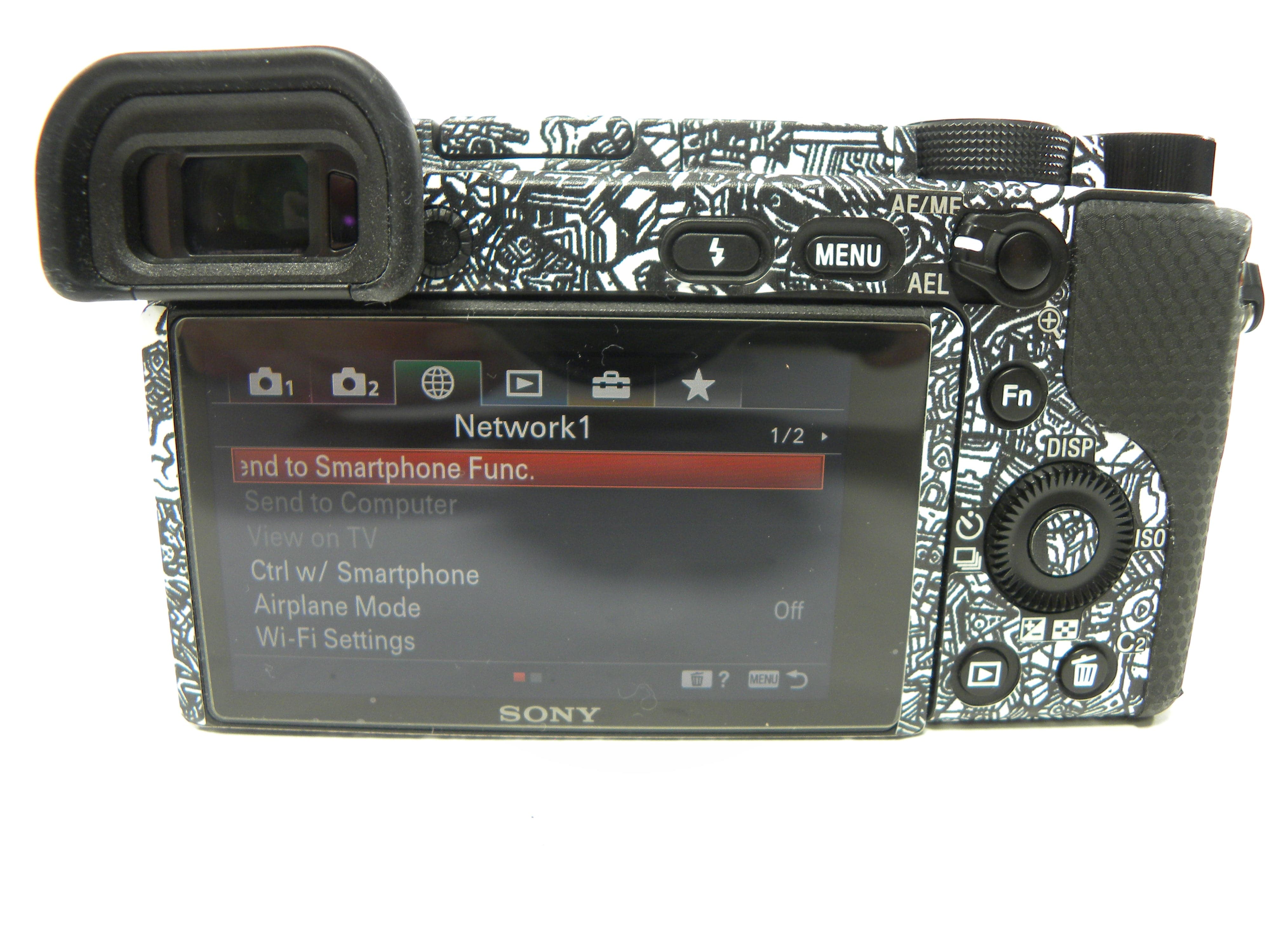 Sony a6400 24.2mp Mirrorless Digital camera Body Only w/Skin Shutter Ct. 5,061