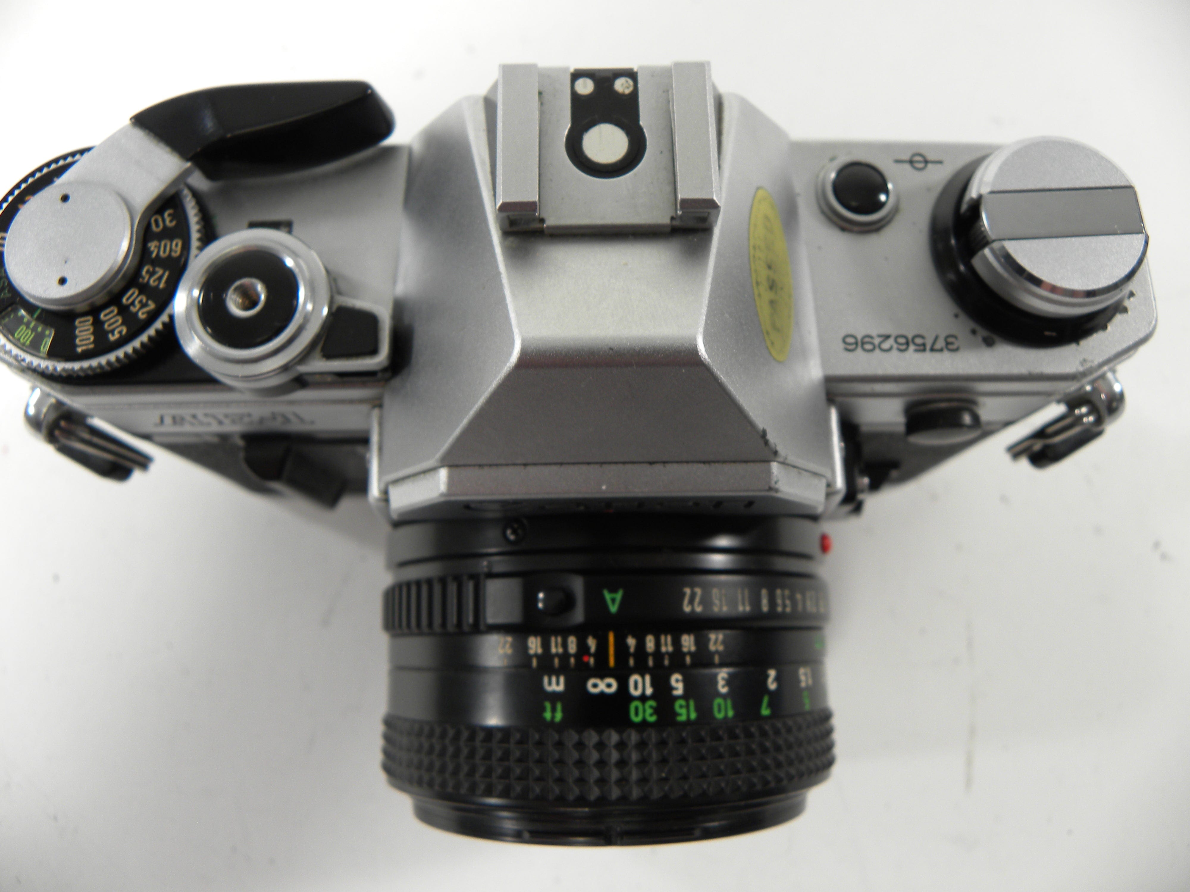 Canon  AE-1 35mm SLR w/FD 50mm f1.8