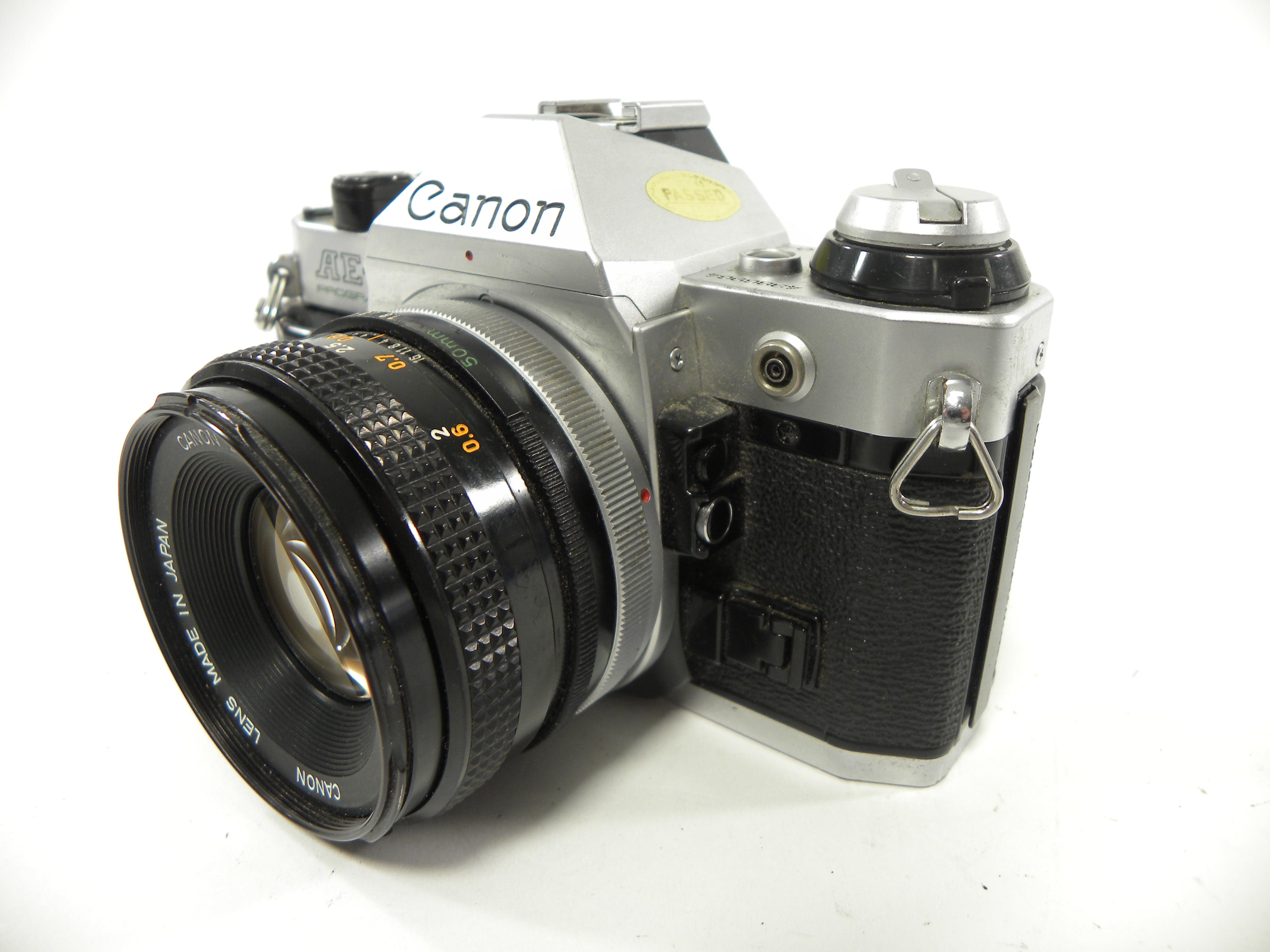 Canon AE-1 Program 35mm SLR Camera with a 50mm f/1.8 S.C. FD Lens
