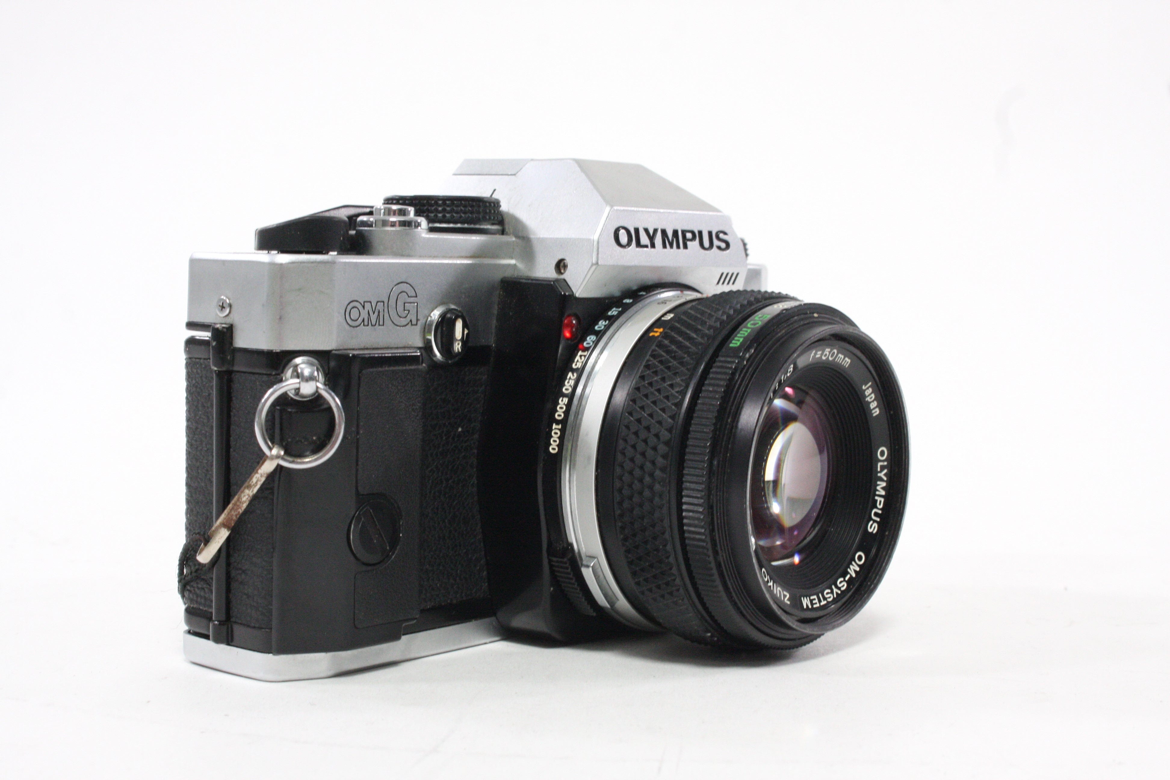 Olympus OMG 35mm SLR Camera with 50mm f/1.8 Lens