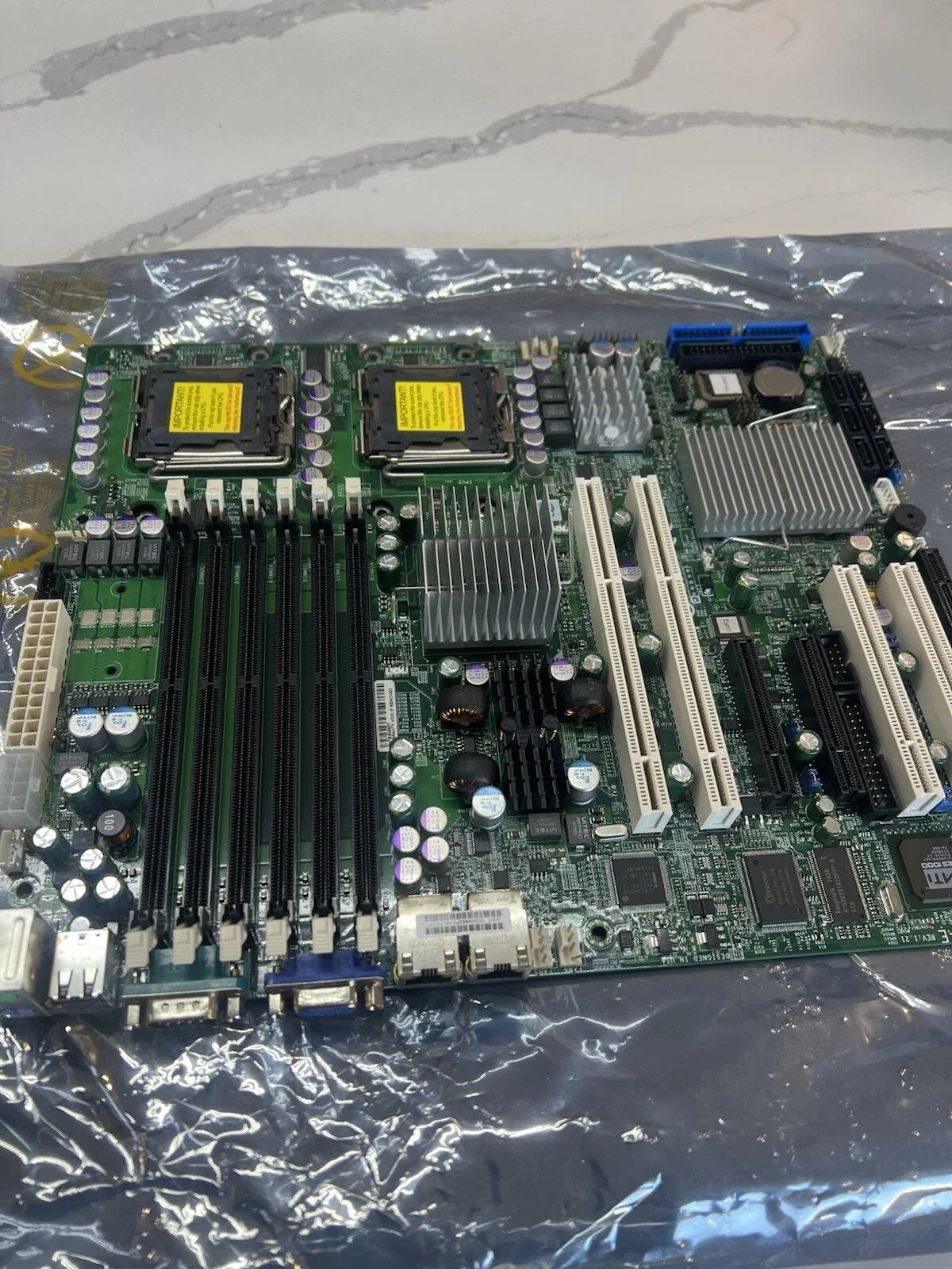 Supermicro X7DVL-E Intel 5000V Dual Socket 771 Video PCI Express IPMI 2.0 Dual Gigabit LAN USB 2.0 SATA RAID ATX Server Motherboard.
