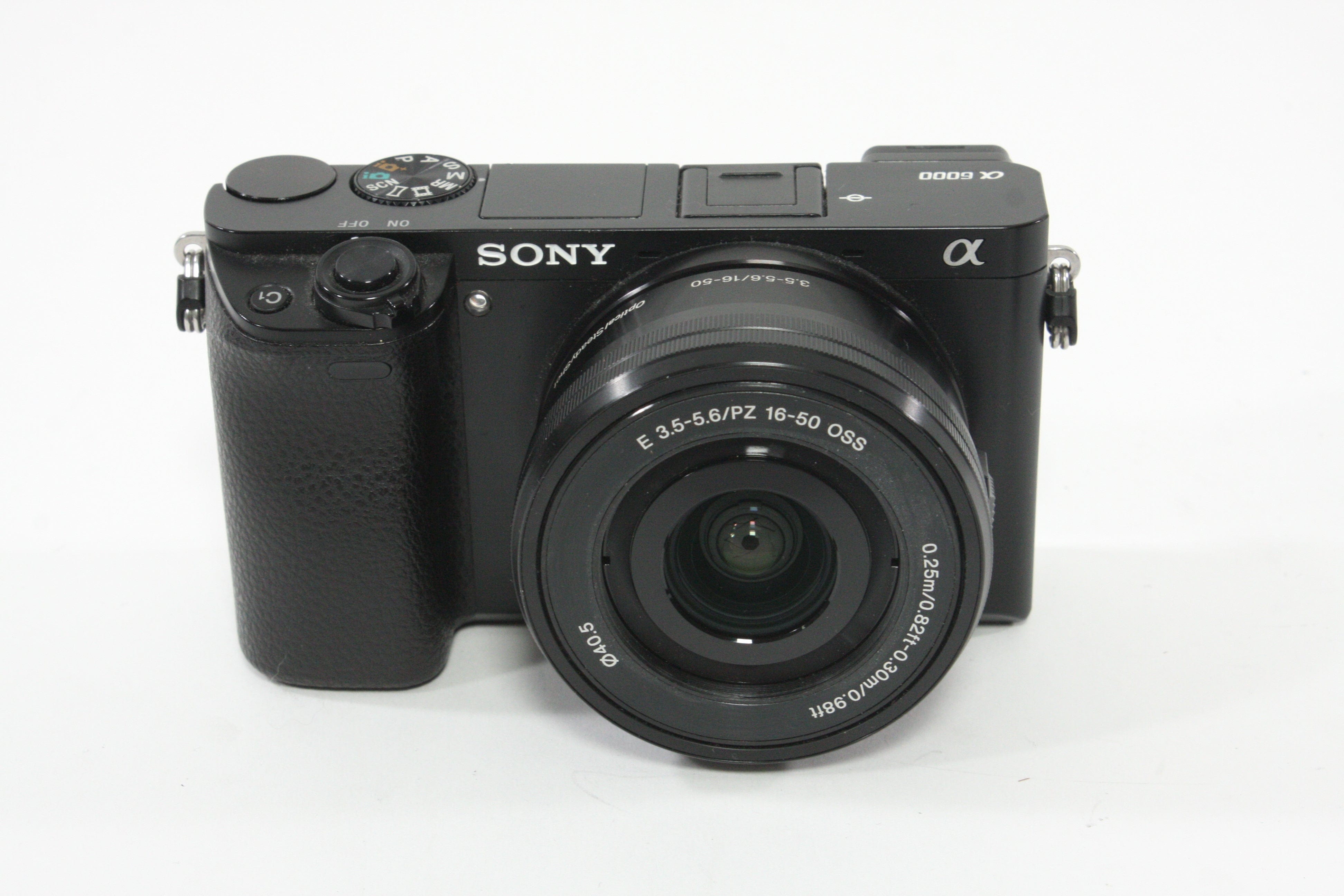 Sony a6000 w/16-60mm F3.5-5.6 Lens + SmallRig Cage and Battery Grip - Shutter Count 7307